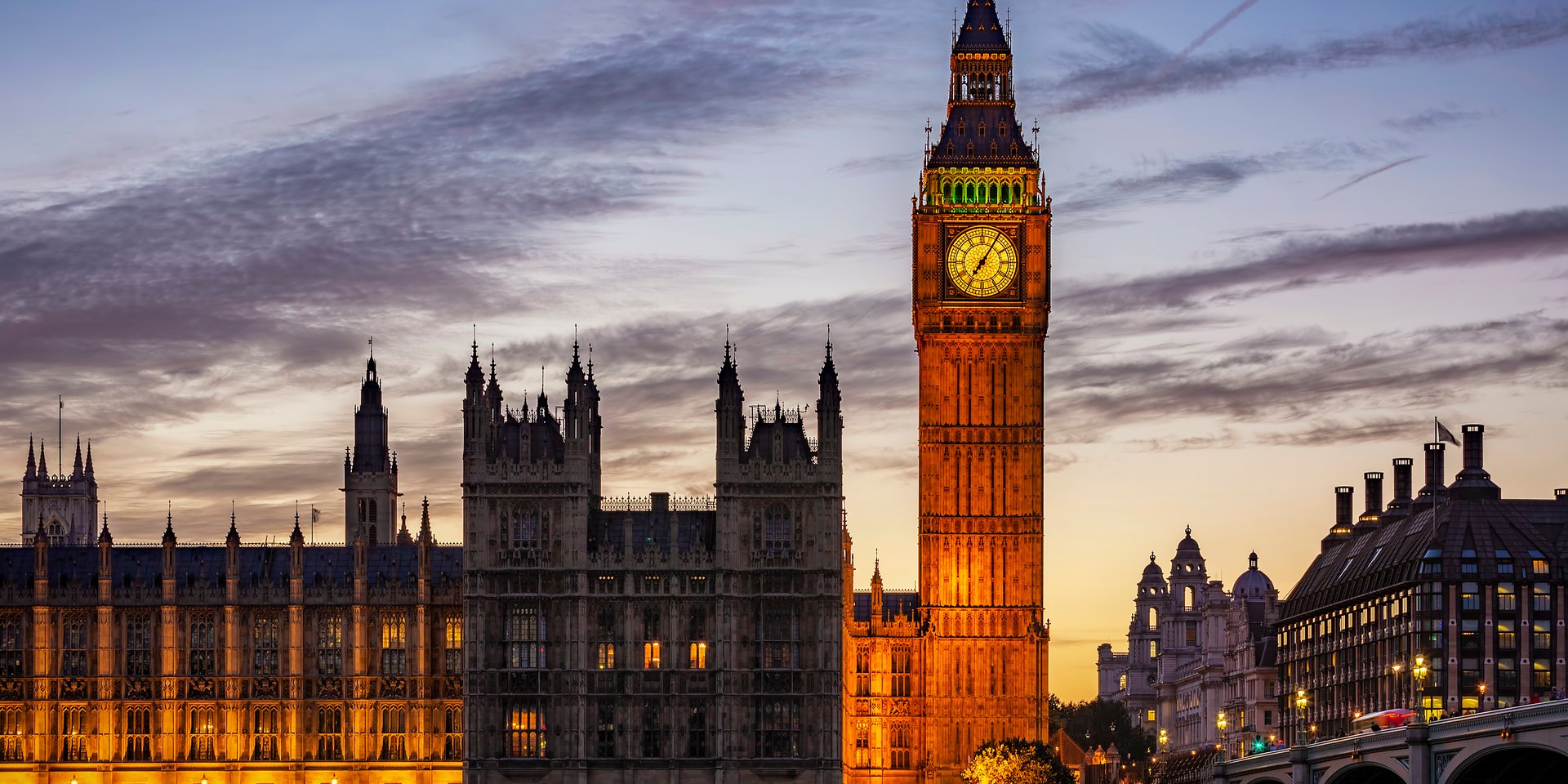 An external image of the Palace of Westminster in the evening