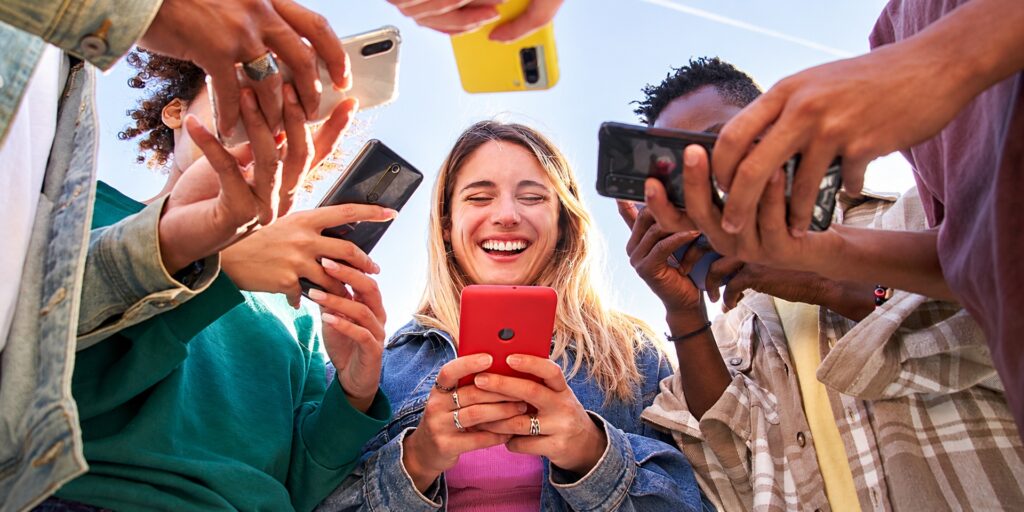 A group of Gen Zers on their phones.